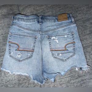 High rise American Eagle jeans with rainbow pockets, size 4